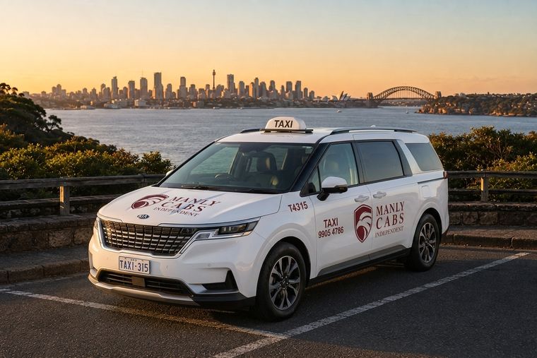 Manly Cabs Independent Kia Carnival maxi taxi with Sydney Harbour in the background